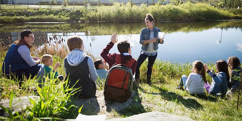 people near a river