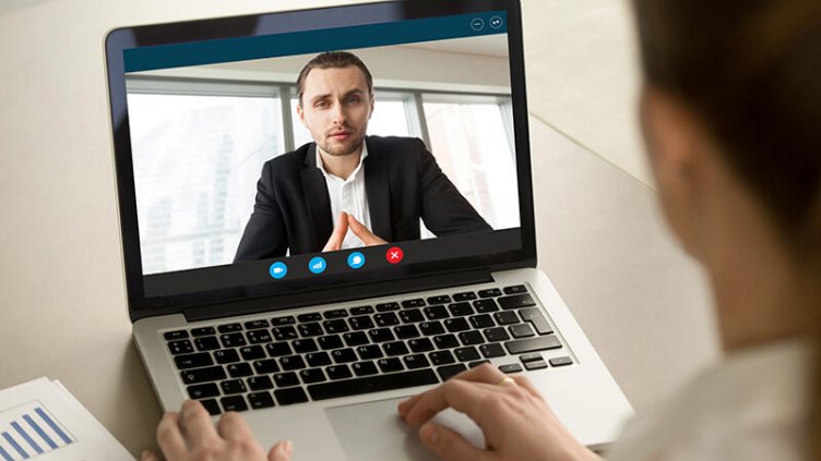 Employees having virtual meeting
