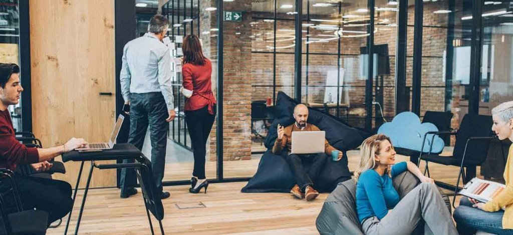 Employees working in the collaborative workspace